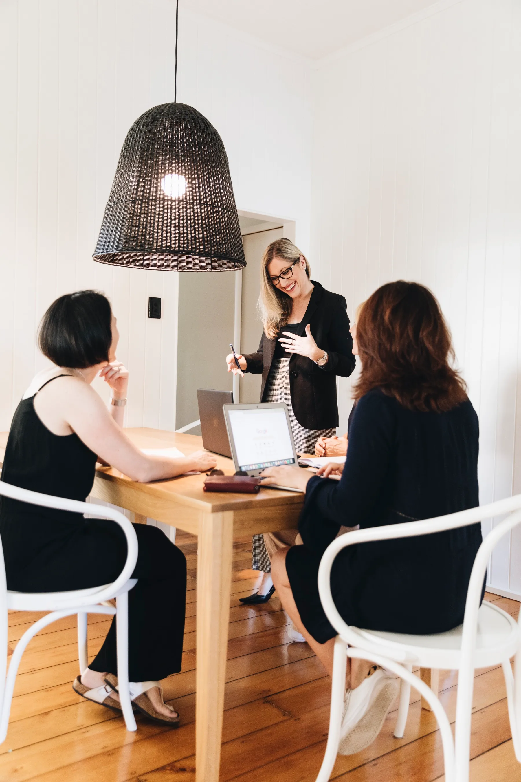 Kristy Hunter leading a marketing strategy session with a client team